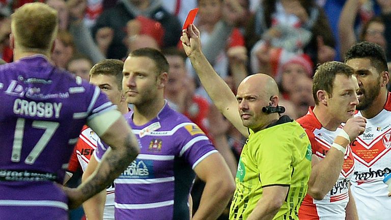 Referee Phil Bentham shows the red card to Wigan Warriors Ben Flower (2nd left) during the First Utility Super League Grand Final match at Old Trafford, Manchester. PRESS ASSOCIATION Photo. Picture date: Saturday October 11, 2014. See PA story RUGBYL Super. Photo credit should read Martin Rickett/PA Wire. RESTRICTIONS: Editorial use only. No commercial use. No false commercial association. No video emulation. No manipulation of images.