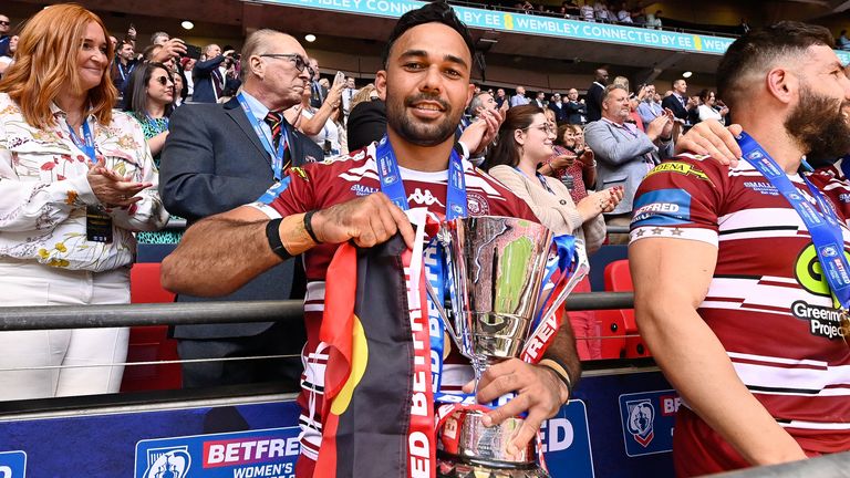 Picture by Allan McKenzie/SWpix.com - 08/06/2024 - Rugby League - Betfred Challenge Cup Final - Warrington Wolves v Wigan Warriors - Wembley Stadium, London, England - Bevan French with the Lance Todd Trophy