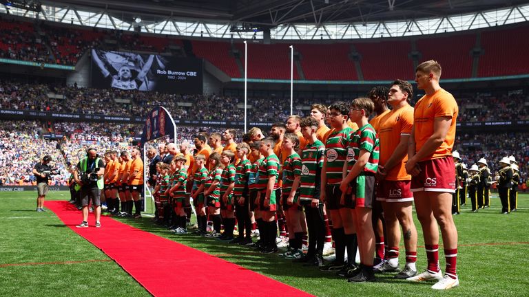 Picture by Ed Sykes/SWpix.com - 08/06/2024 - Rugby League - Betfred Challenge Cup Final - Warrington Wolves v Wigan Warriors - Wembley Stadium, London, England -  Warrington Wolves and Wigan Warriors players lined up