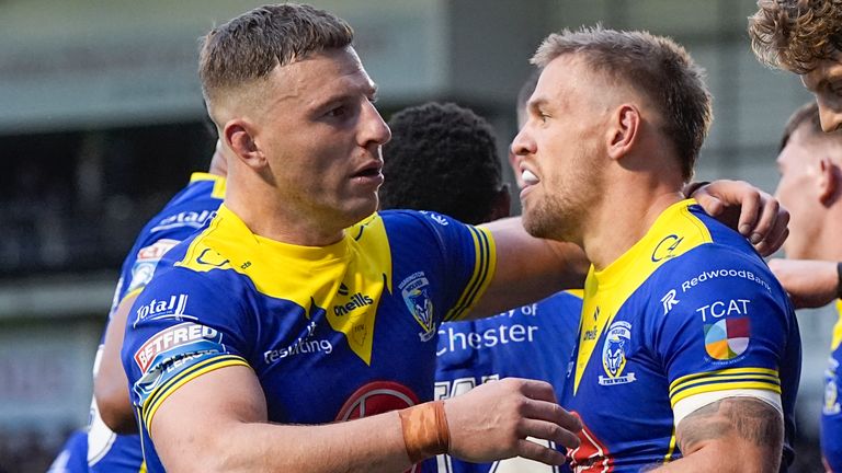 Picture by Olly Hassell/SWpix.com - 11/07/2024 - Rugby League - Betfred Super League Round 17 - Warrington Wolves v Leeds Rhinos - Halliwell Jones Stadium, Warrington, England - Matt Dufty of Warrington celebrates his try with George Williams of Warrington